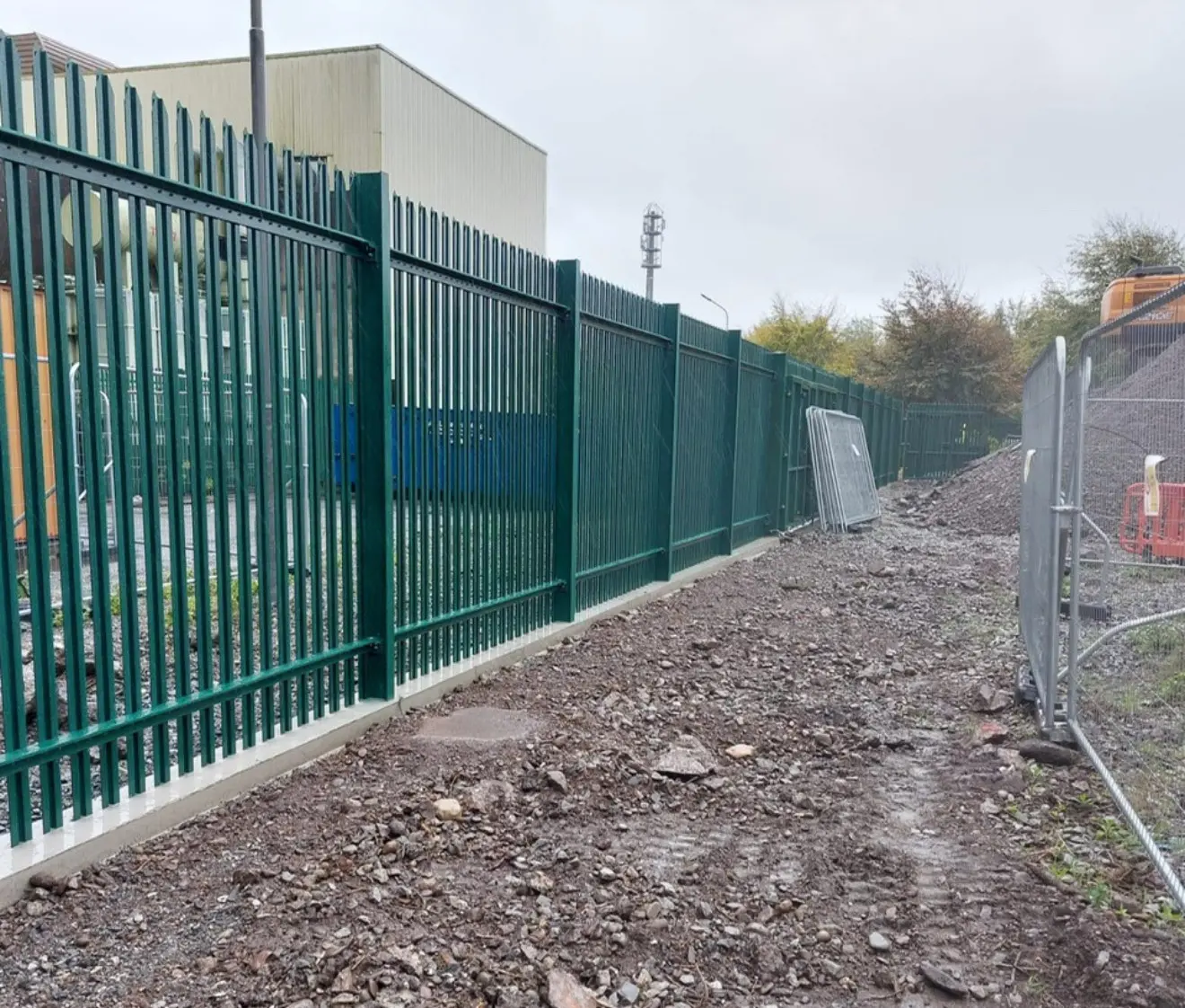 Commercial perimeter fencing installed on a site
